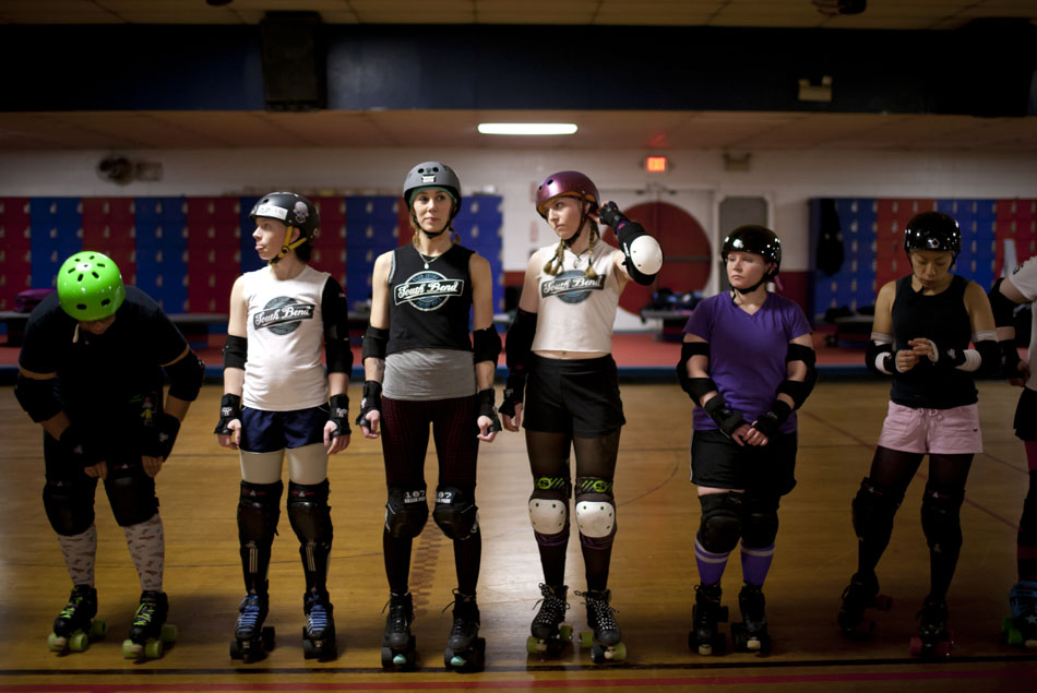 Members of the South Bend Roller Girls, including Shannon Hoyt, third from left, line up for a drill during a practice on Thursday, April 12, 2012, at USA Skate Center in Mishawaka. Hoyt, known as "Hoytie Toity," helped organize the team two years ago when she posted to her Facebook asking if any of her friends were interested in starting a derby team. (James Brosher/South Bend Tribune)