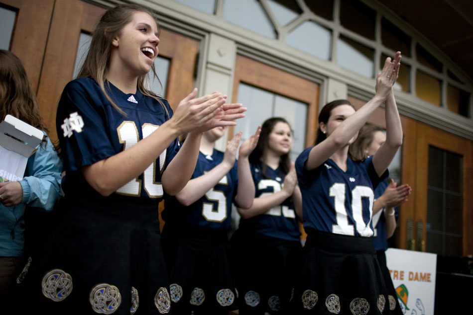 Members of the Irish Step Team react to their performance during an unveiling ceremony for The Shirt 2012 on Friday, April 20, 2012, at the Hammes Bookstore at Notre Dame. (James Brosher/South Bend Tribune)