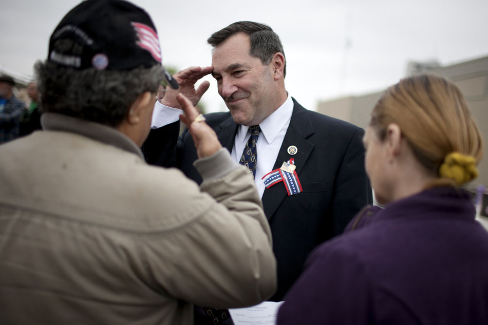 U.S. Rep. Joe Donnelly, D-Granger, salutes a veteran before speaking at a ceremony dedicating the new VA Community Based Outpatient Clinic on Monday, April 30, 2012, in South Bend. (James Brosher/South Bend Tribune)