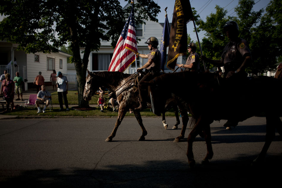 Mounted St. Joseph County police officers ride in the Westside Memorial Day Parade on Monday, May 28, 2012, in South Bend. (James Brosher/South Bend Tribune)