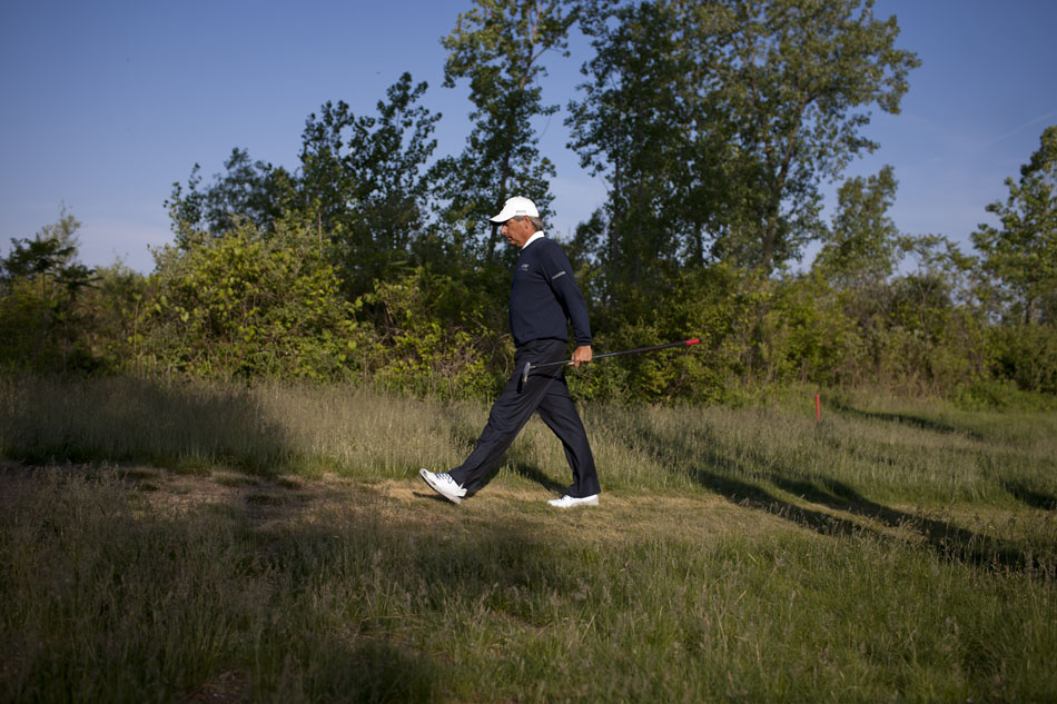 Fred Couples walks from the first green to the second tee boxes after a bogey five during the opening round of the Senior PGA Championship on Thursday, May 24, 2012, at Harbor Shores in Benton Harbor, Mich. Couples finished the day with a five-over-par 76. (James Brosher/South Bend Tribune)
