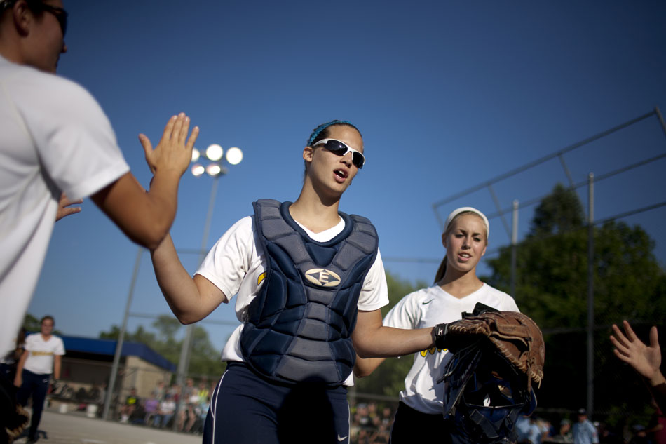 Riley catcher Jillian Busfield runs onto the field after being introduced before a Class 4A softball regional final on Tuesday, May 29, 2012, at Riley High School in South Bend. (James Brosher/South Bend Tribune)