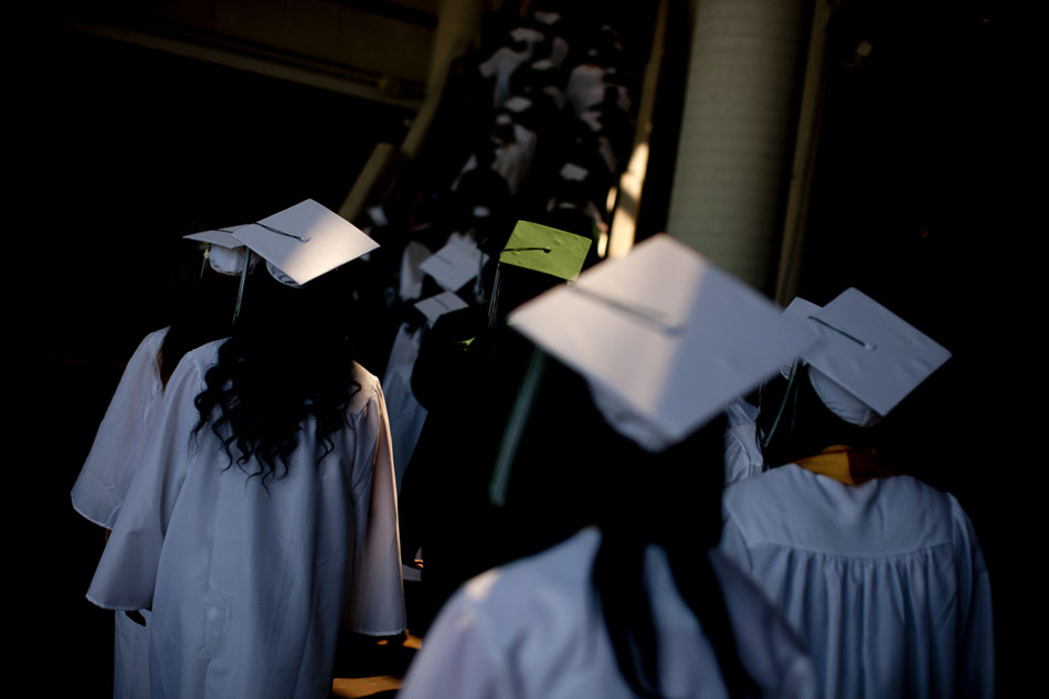 Mortar boards are seen as graduates make their way from the lower level of the Century Center before Washington High School commencement exercises on Saturday, June 9, 2012, in downtown South Bend. (James Brosher/South Bend Tribune)