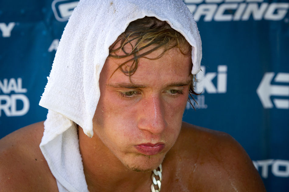 French rider Marvin Musquin tries to cool off after the 250 motocross race at the Red Bull Redbud National on Saturday, July 7, 2012, in Buchanan, Mich. Musquin finished fourth. (James Brosher/South Bend Tribune)
