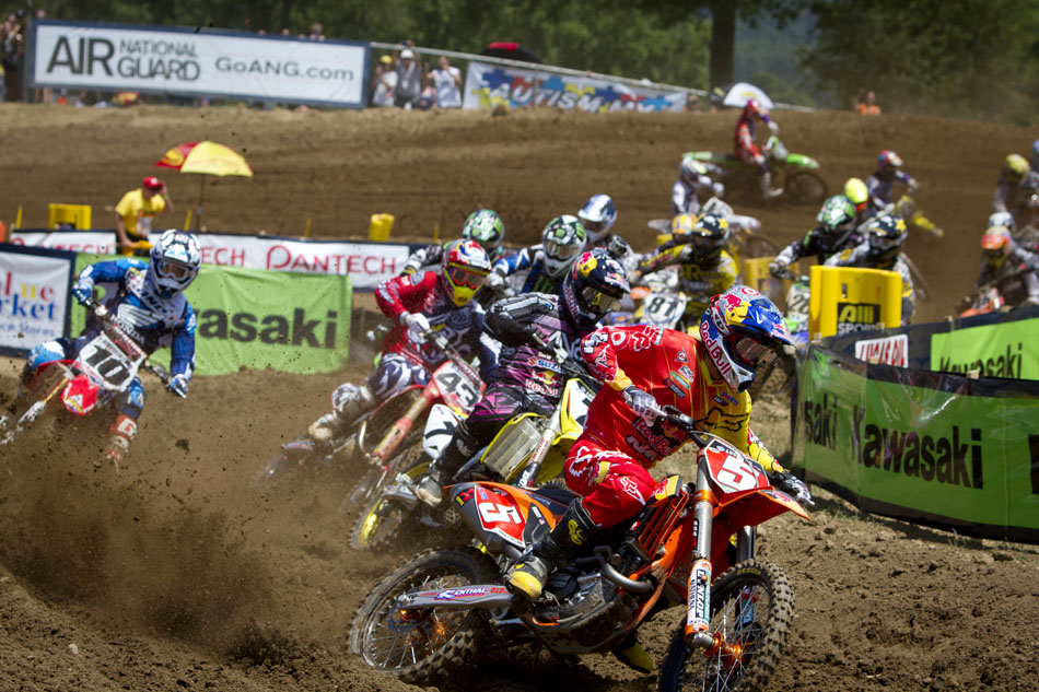 Ryan Dungey (5) leads the field through a set of turns early in the 450 motocross at the Red Bull Redbud National on Saturday, July 7, 2012, in Buchanan, Mich. Dungey dominated the race en route to a win. (James Brosher/South Bend Tribune)