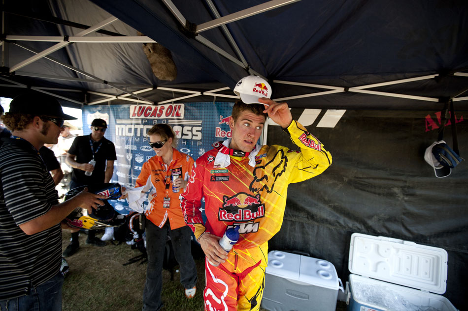 Ryan Dungey puts on a hat as he prepares to walk into the winner's circle after winning the 450 motocross at the Red Bull Redbud National on Saturday, July 7, 2012, in Buchanan, Mich. (James Brosher/South Bend Tribune)