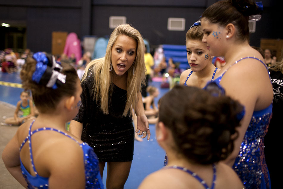 Marybeth Cox, an assistant coach of the Starlets twirling team, pumps up her girls before their performance in the America's Youth on Parade competition on Monday, July 16, 2012, at Notre Dame. (James Brosher/South Bend Tribune)