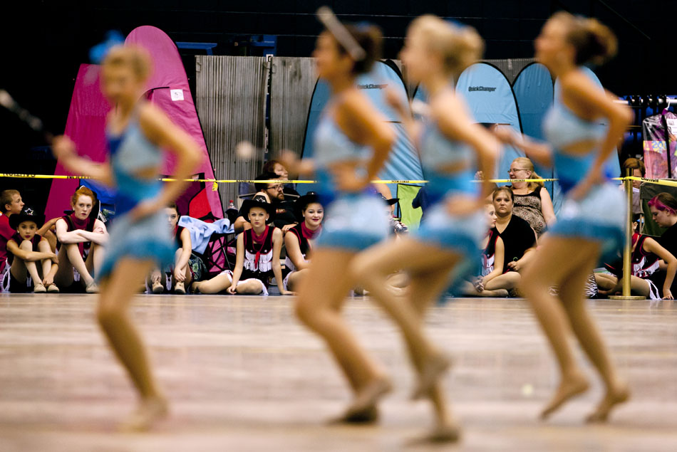 A twirling team watches its competition from across the arena during the America's Youth on Parade twirling competition on Monday, July 16, 2012, at Notre Dame. (James Brosher/South Bend Tribune)