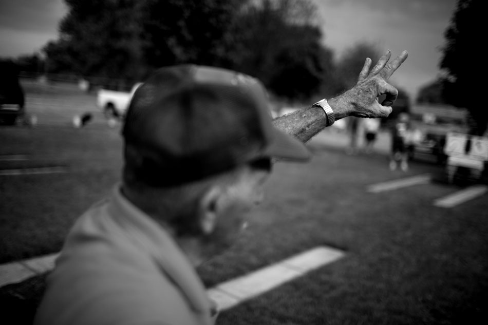Chuck VanCamp, founder of the Mishawaka Horseshoe Pitching Club, signals three for an opponent's score on Wednesday, July 18, 2012, at Bendix Park in Mishawaka. (James Brosher/South Bend Tribune)