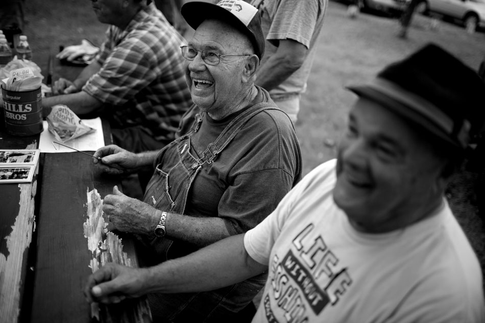 Bus Kelver, left, of Osceola, reminisces with fellow members of the Mishawaka Horseshoe Pitching Club including Gene Ingle of Edwardsburg, Mich., on Wednesday, July 18, 2012, at Bendix Park in Mishawaka. (James Brosher/South Bend Tribune)