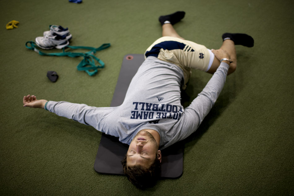 Notre Dame tight end Tyler Eifert stretches during a workout on Wednesday, May 30, 2012, at AWP Sports Performance in Fort Wayne. (James Brosher/South Bend Tribune)