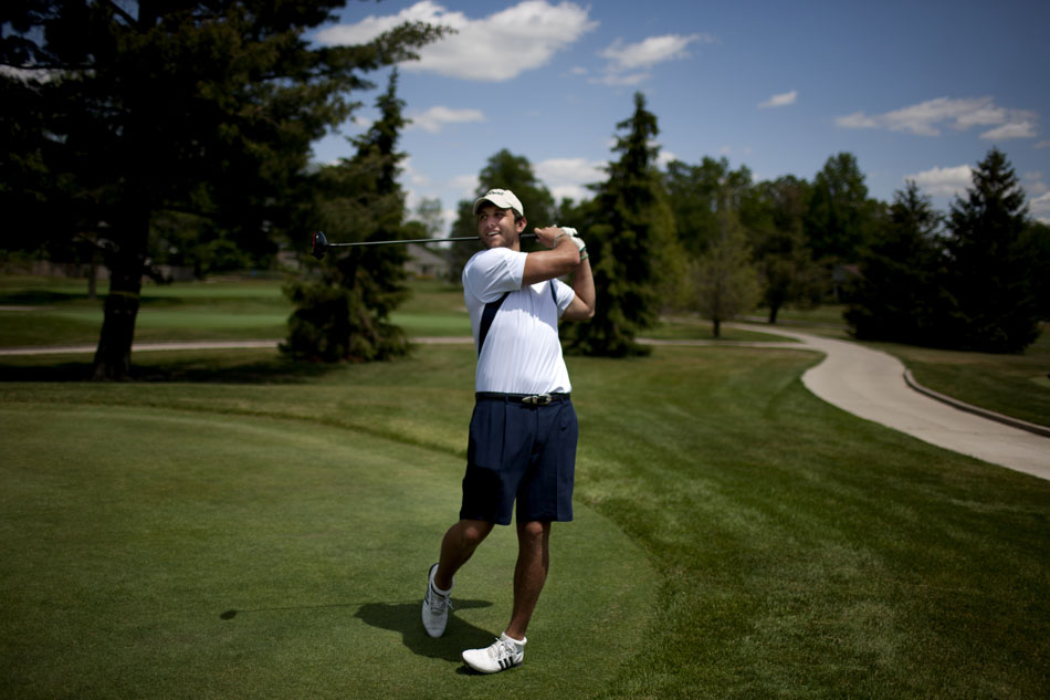 Notre Dame tight end Tyler Eifert shares a laugh as he takes a few practice swings during a round of golf with his uncle on Wednesday, May 30, 2012, at Pine Valley Country Club in Fort Wayne. During the round, Eifert hit a drive that traveled close to 371 yards, barely missing coming up short of a par 4 green. (James Brosher/South Bend Tribune)