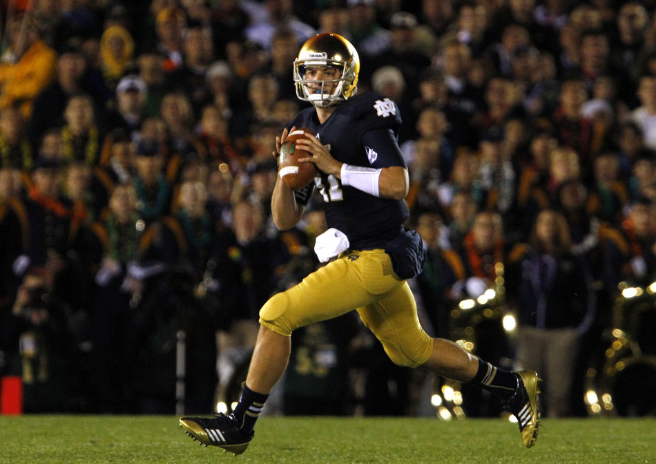 Notre Dame quarterback Tommy Rees looks to throw during a NCAA college football game on Saturday, Sept. 22, 2012, at Notre Dame. (James Brosher/South Bend Tribune)