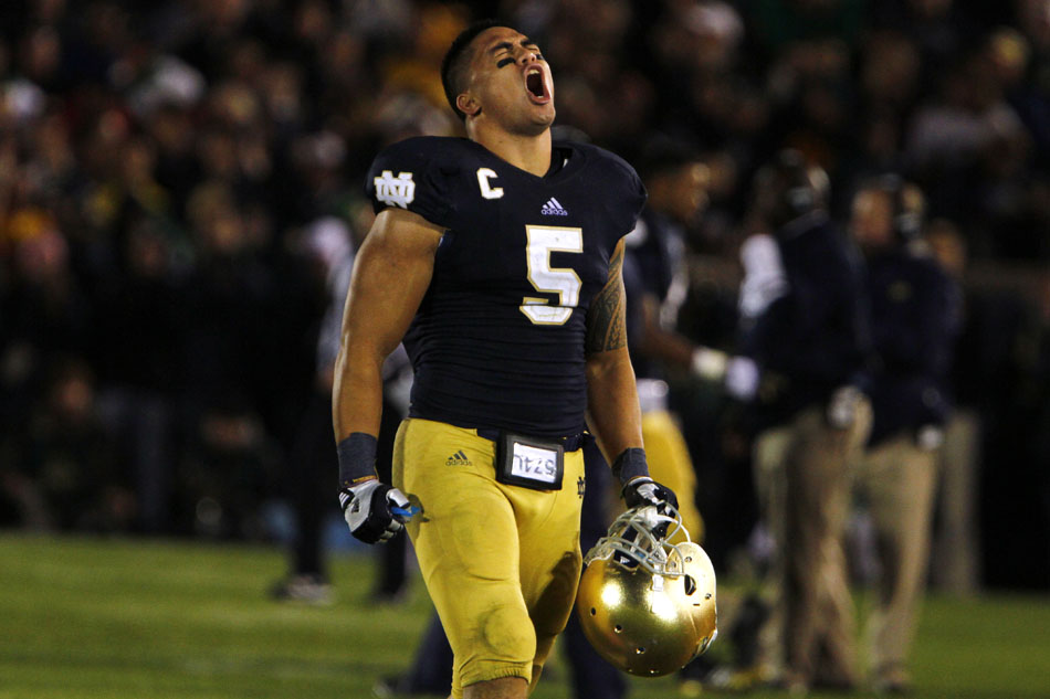 Notre Dame linebacker Manti Te'o celebrates a late first down, allowing the Irish to run out the clock during a NCAA college football game on Saturday, Sept. 22, 2012, at Notre Dame. (James Brosher/South Bend Tribune)