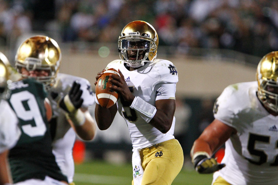 Notre Dame quarterback Everett Golson looks to pass during a NCAA college football game on Saturday, Sept. 15, 2012, in East Lansing, Mich. (James Brosher/South Bend Tribune)