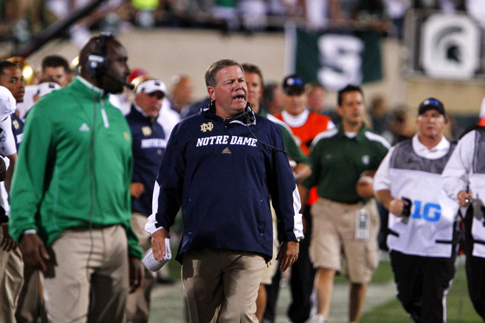 Notre Dame head coach Brian Kelly yells to a player during a NCAA college football game on Saturday, Sept. 15, 2012, in East Lansing, Mich. (James Brosher/South Bend Tribune)