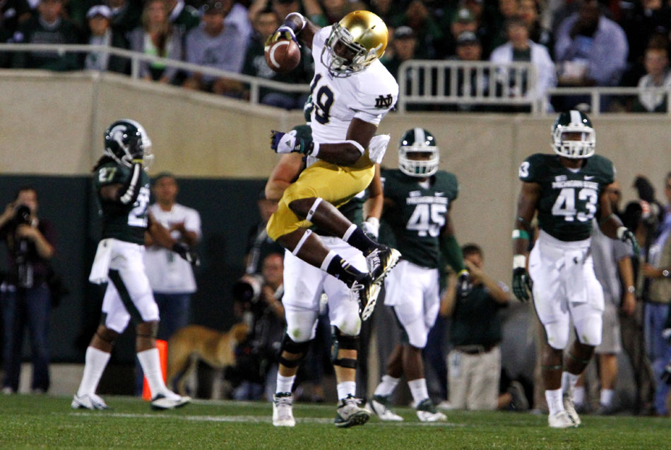 Notre Dame wide receiver Davonte' Neal shows his frustration after signaling for a fair catch on a punt then running after muffing it during a NCAA college football game on Saturday, Sept. 15, 2012, in East Lansing, Mich. Neal was flagged for delay of game. (James Brosher/South Bend Tribune)