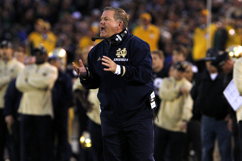 Notre Dame head coach Brian Kelly yells to an official during a NCAA college football game on Saturday, Oct. 20, 2012, at Notre Dame. (James Brosher/South Bend Tribune)