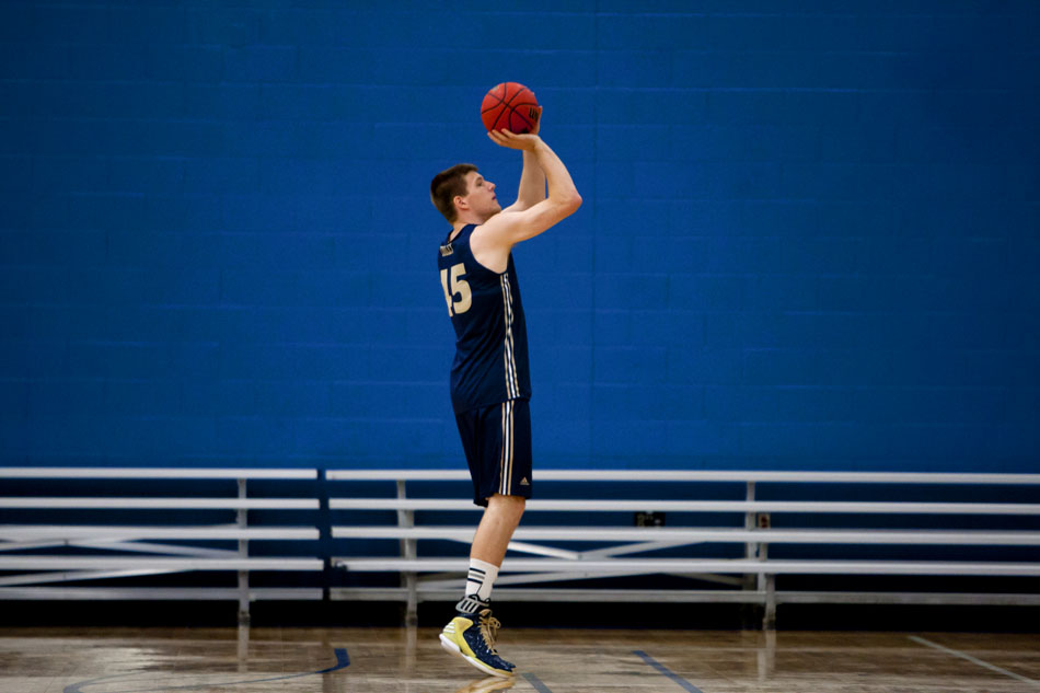 Notre Dame forward Jack Cooley practices a jumper during an open practice on Tuesday, Oct. 23, 2012, at the Kroc Center in South Bend. (James Brosher/South Bend Tribune)