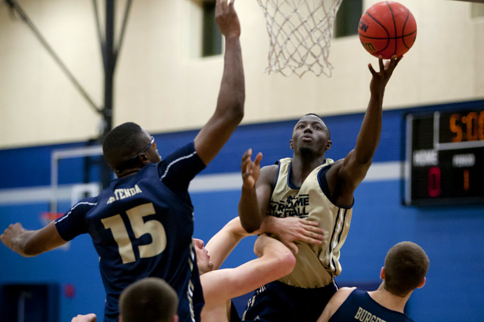 Notre Dame's Jerian Grant, right, puts up a shot during an open practice on Tuesday, Oct. 23, 2012, at the Kroc Center in South Bend. (James Brosher/South Bend Tribune)