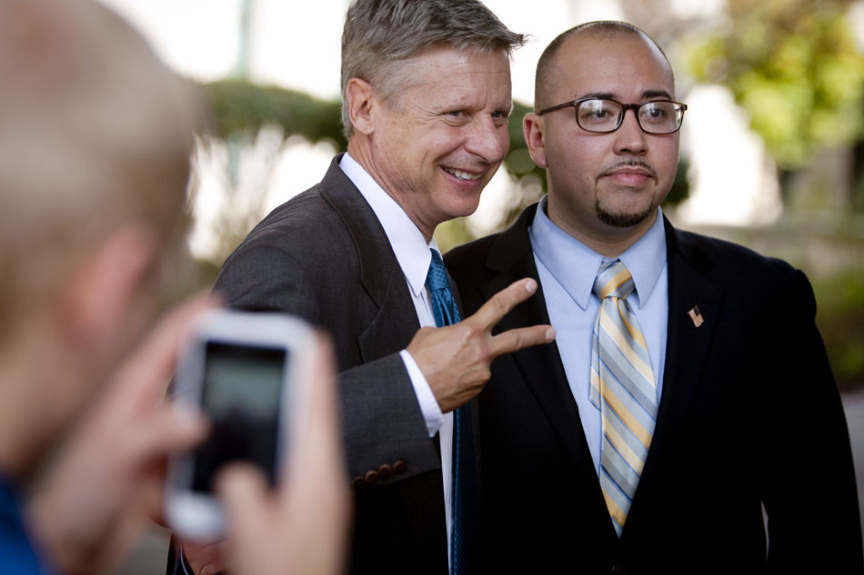 Gary Johnson, left, the Libertarian presidential candidate, poses for a few photos with Joe Ruiz, who is running for Indiana's 2nd congressional district seat on the same ticket, during an appearance on Wednesday, Oct. 24, 2012, at Indiana University-South Bend. Johnson spoke to a political science class before fielding questions from local media. (James Brosher/South Bend Tribune)
