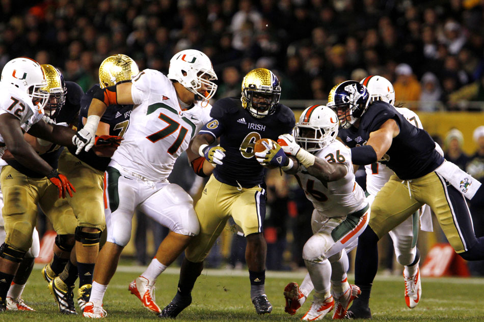 Notre Dame running back Theo Riddick (6) finds a hole during a NCAA college football game on Saturday, Oct. 6, 2012, at Soldier Field in Chicago. (James Brosher/South Bend Tribune)