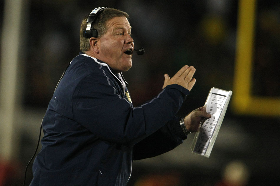 Notre Dame head coach Brian Kelly yells to his players during an NCAA college football game on Saturday, Nov. 24, 2012, at the Los Angeles Memorial Coliseum. (James Brosher/South Bend Tribune)