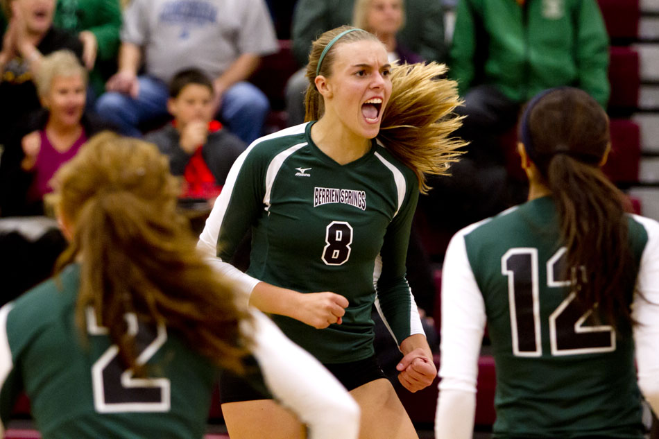 Berrien Springs' Holly Tolliver (8) celebrates a score with her teammates during a district semi-final on Wednesday, Oct. 31, 2012, in Buchanan, Mich. (James Brosher/South Bend Tribune)