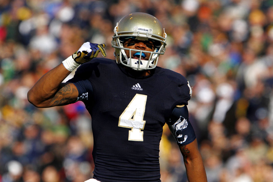 Notre Dame running back George Atkinson III (4) pumps up the crowd before returning the opening kick off during an NCAA college football game on Saturday, Nov. 3, 2012, at Notre Dame. (James Brosher/South Bend Tribune)