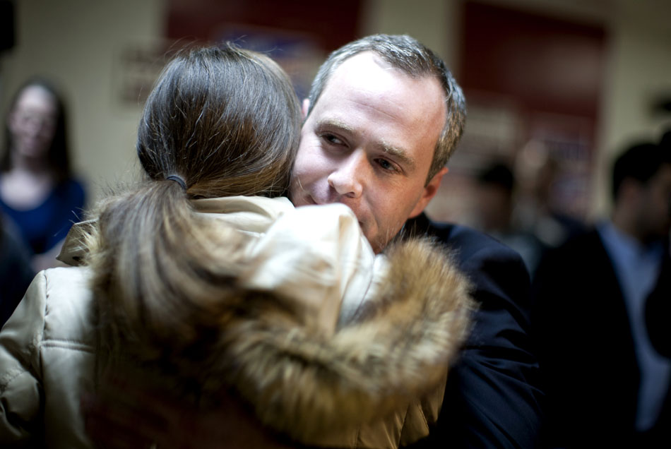Brendan Mullen, a Democrat, hugs his wife Suzanne after he conceded the race for Indiana's 2nd congressional district to Republican rival Jackie Walorski during a post-election rally on Tuesday, Nov. 6, 2012, at the West Side Democratic Club in South Bend. (James Brosher/South Bend Tribune)