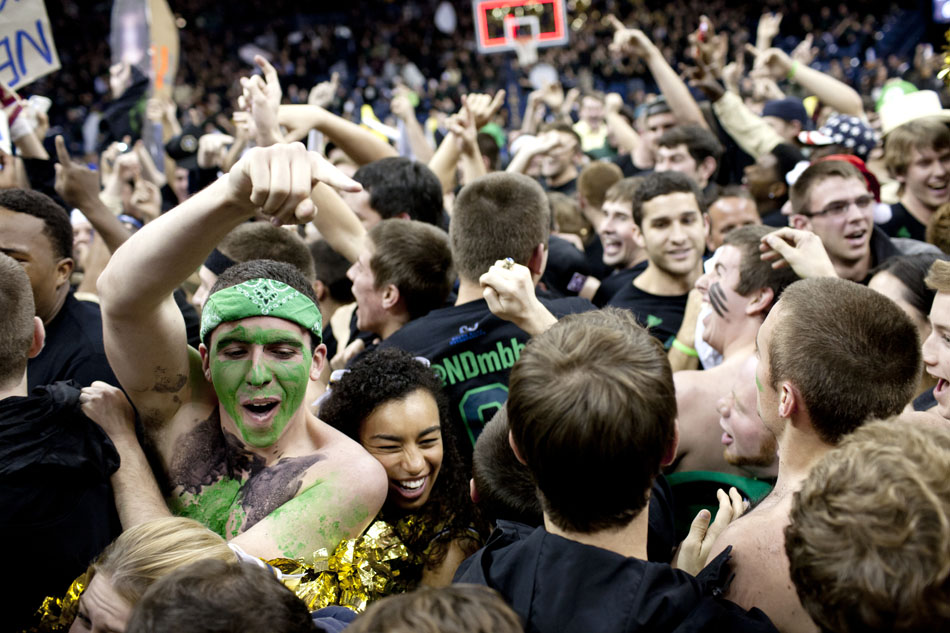 Notre Dame fans rush the court following a 64-50 win against Kentucky on Thursday, Nov. 29, 2012, at the Purcell Pavilion at Notre Dame. (James Brosher/South Bend Tribune)