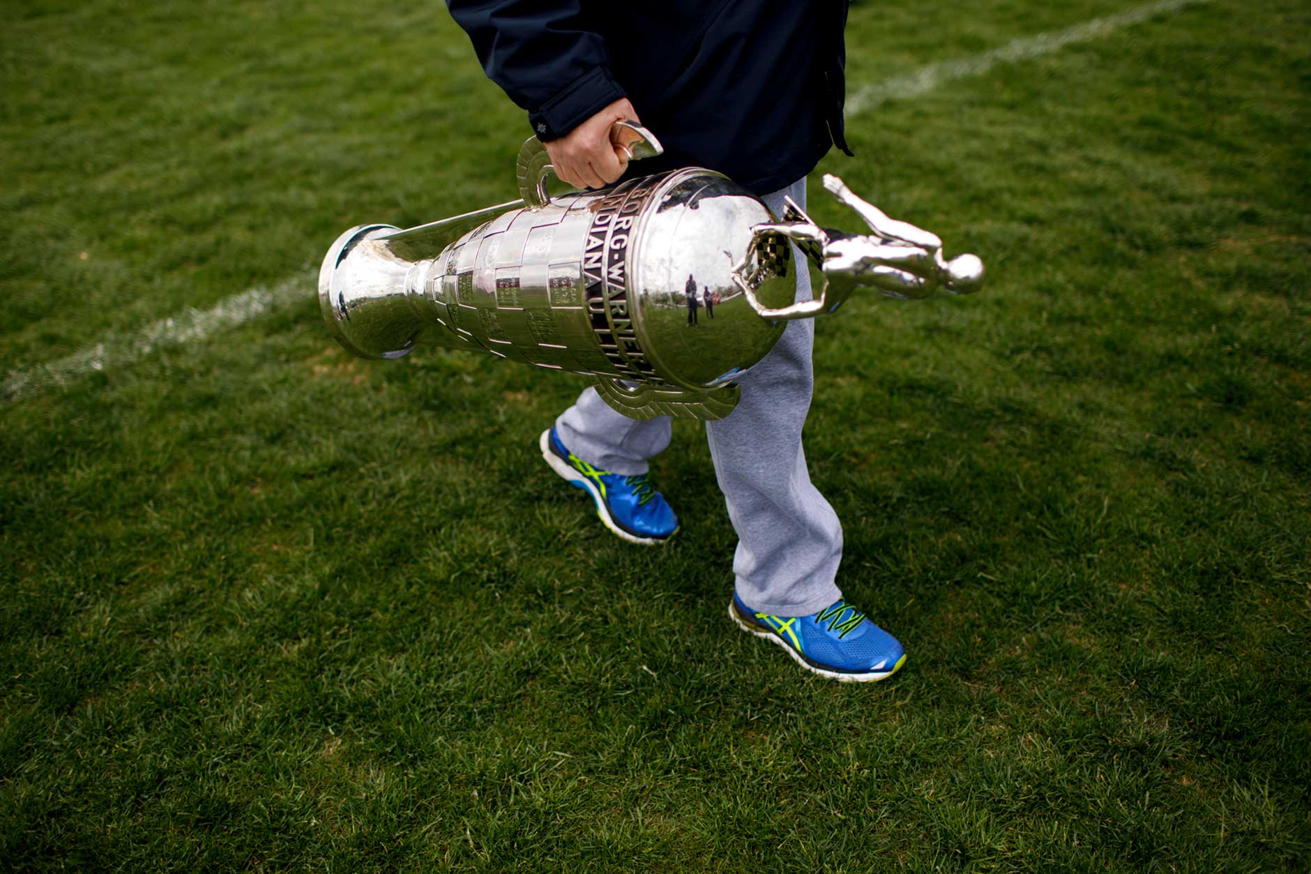 The Borg-Warner Trophy is carried across the infield before the Men's Little 500 at Bill Armstrong Stadium on Saturday, April 22, 2017. (James Brosher/IU Communications)