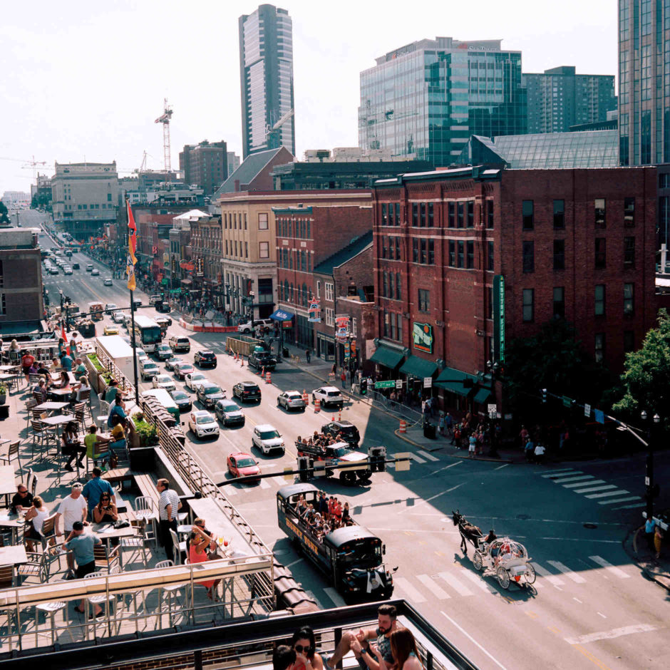 Lower Broadway, Nashville, Tennessee's honky tonk district, is pictured from a rooftop on Saturday, May 19, 2018. (Photo by James Brosher)