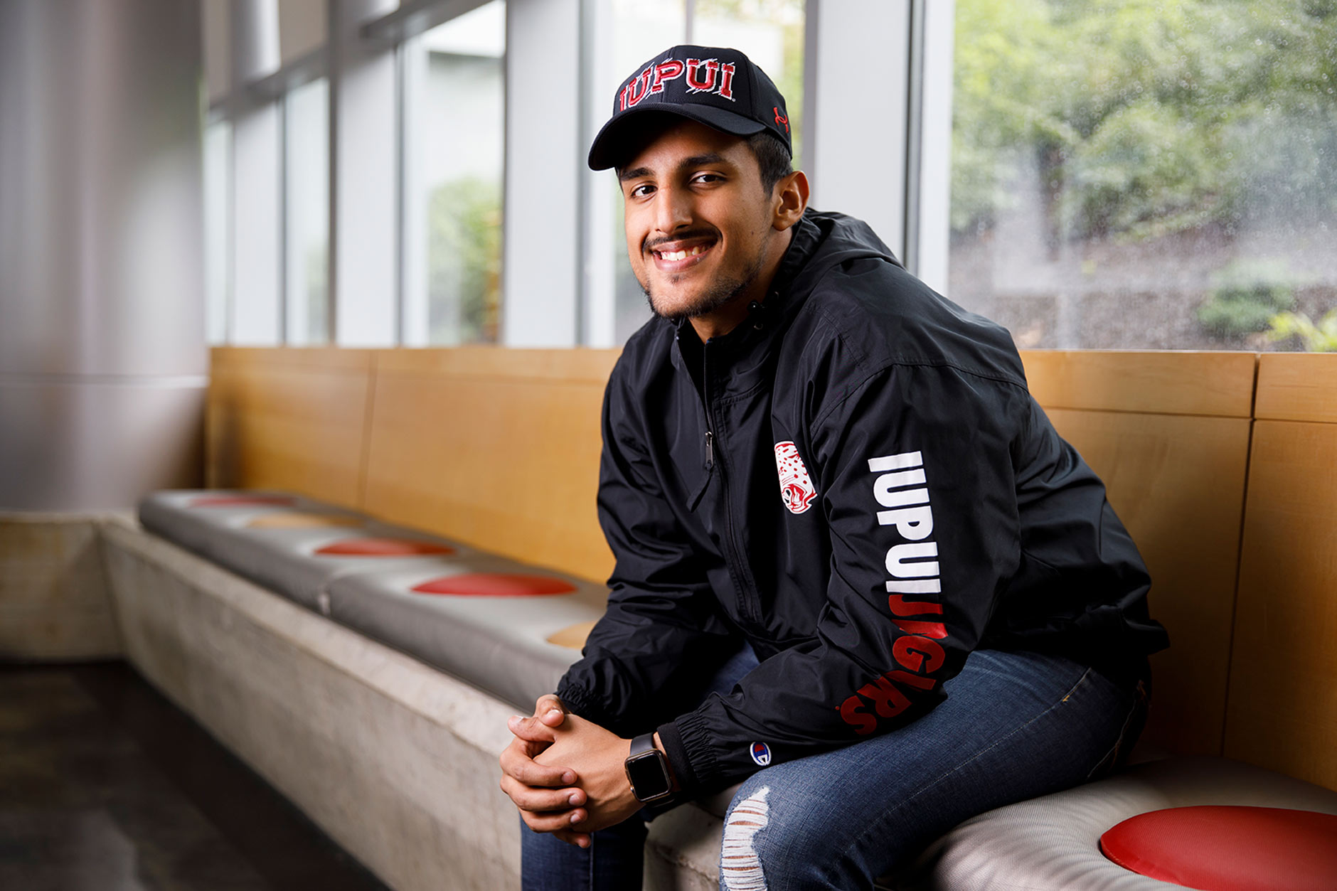 IUPUI student Joshua Khan poses for a portrait during a IUPUI apparel fashion photo shoot at the Campus Center on Wednesday, Aug. 8, 2018.