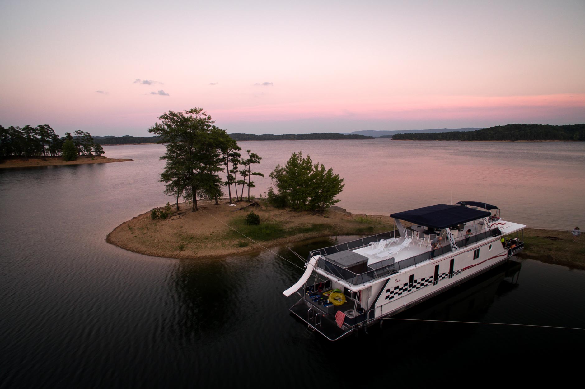 A DreamChaser boat is docked in a cove on Lake Ouachita, Arkansas on Monday, Aug. 20, 2018. (Photo by James Brosher)