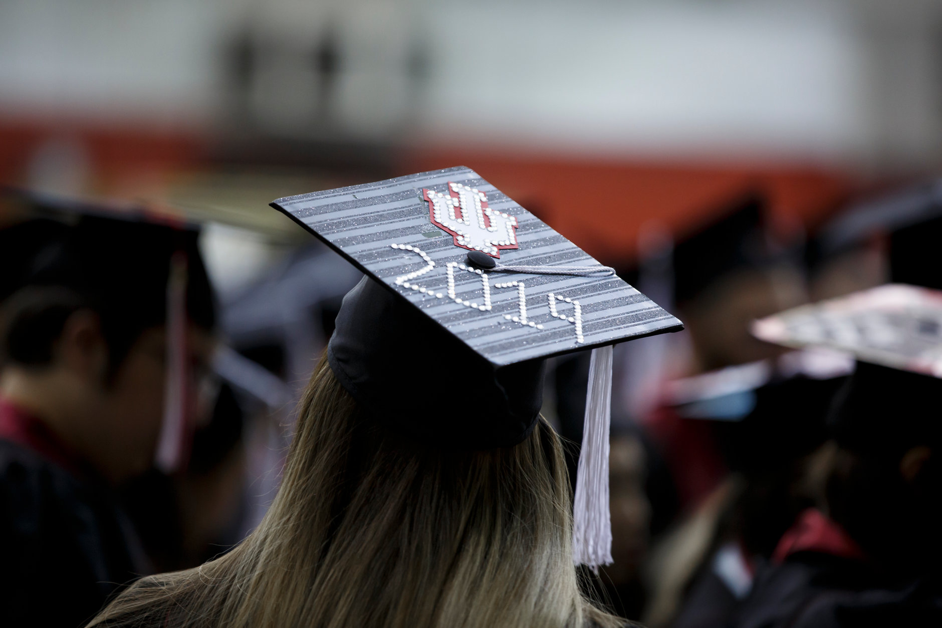 A graduate wears a decorated mortarboard before the Indiana University Bloomington Undergraduate Commencement inside Mellencamp Pavilion on Saturday, May 4, 2019. (James Brosher/Indiana University)