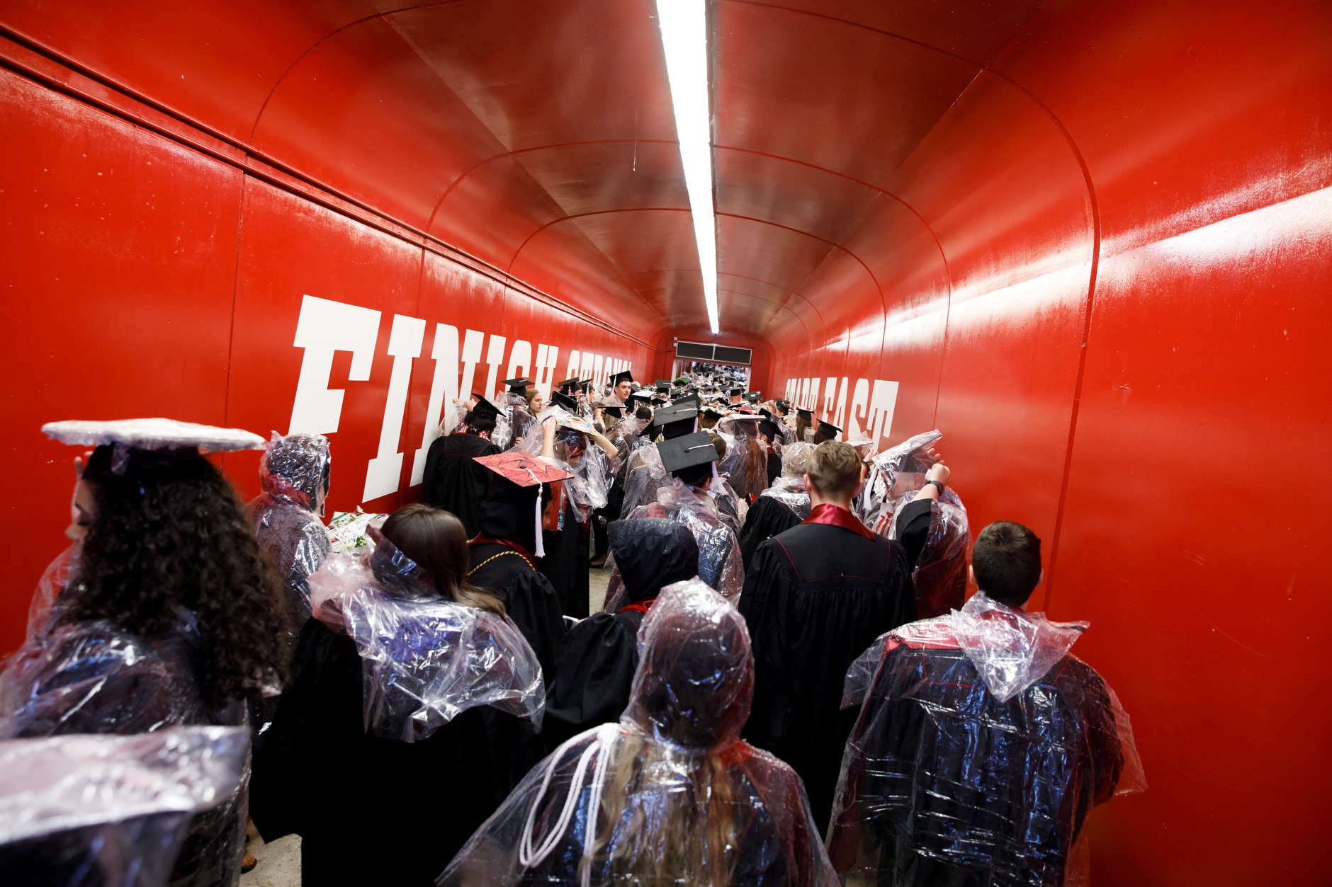 Graduates walk in the processional for the Indiana University Bloomington Undergraduate Commencement at Memorial Stadium on Saturday, May 4, 2019. (James Brosher/Indiana University)