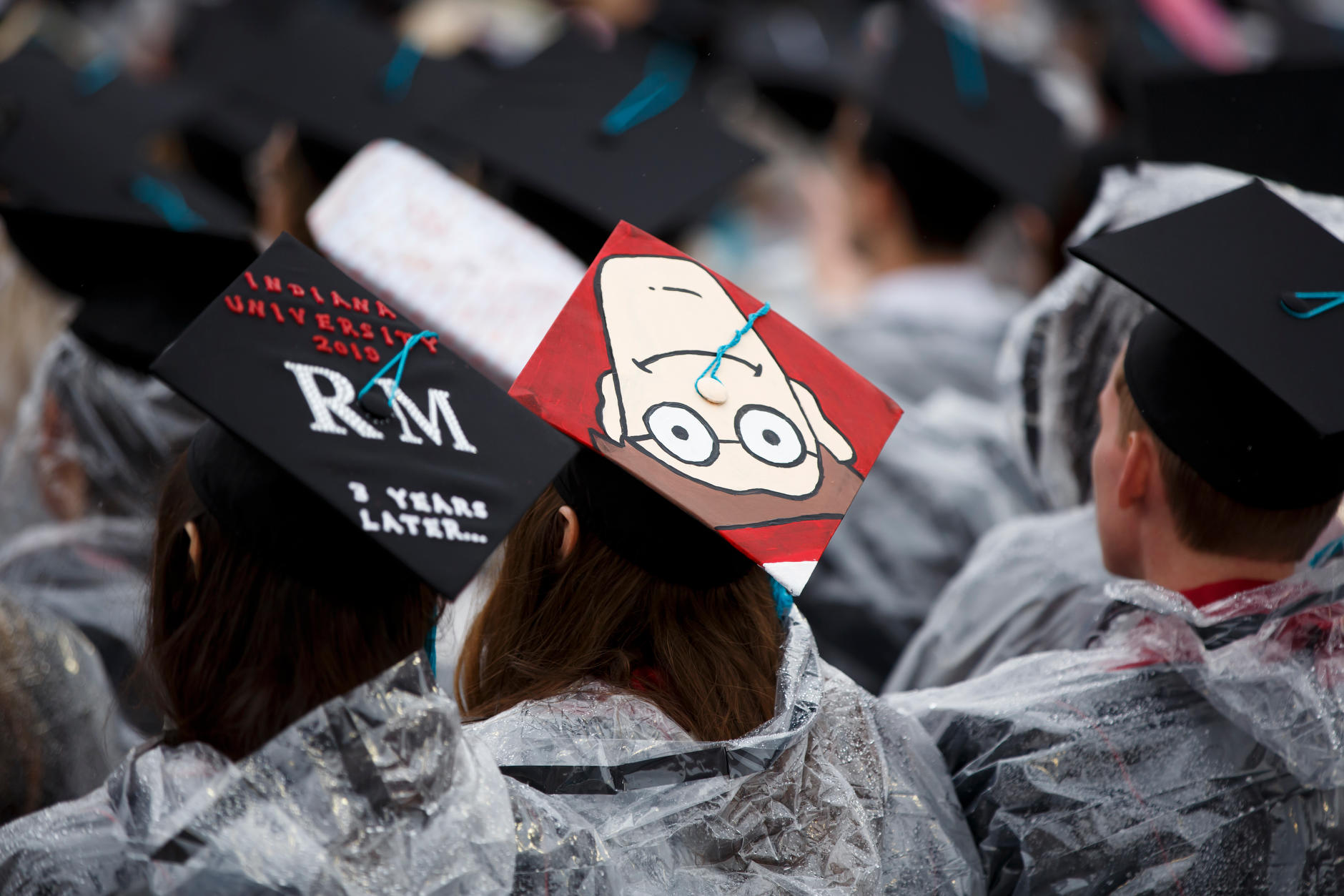 A graduate wears a mortarboard decorated with the character Waldo during the Indiana University Bloomington Undergraduate Commencement at Memorial Stadium on Saturday, May 4, 2019. (James Brosher/Indiana University)