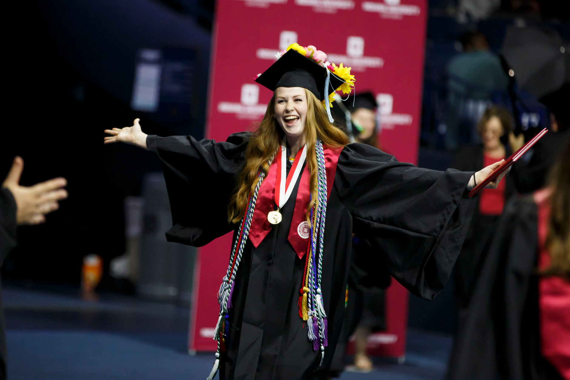 A graduate celebrates after receiving her diploma during the IU South Bend Commencement at the University of Notre Dame on Tuesday, May 7, 2019. (James Brosher/Indiana University)