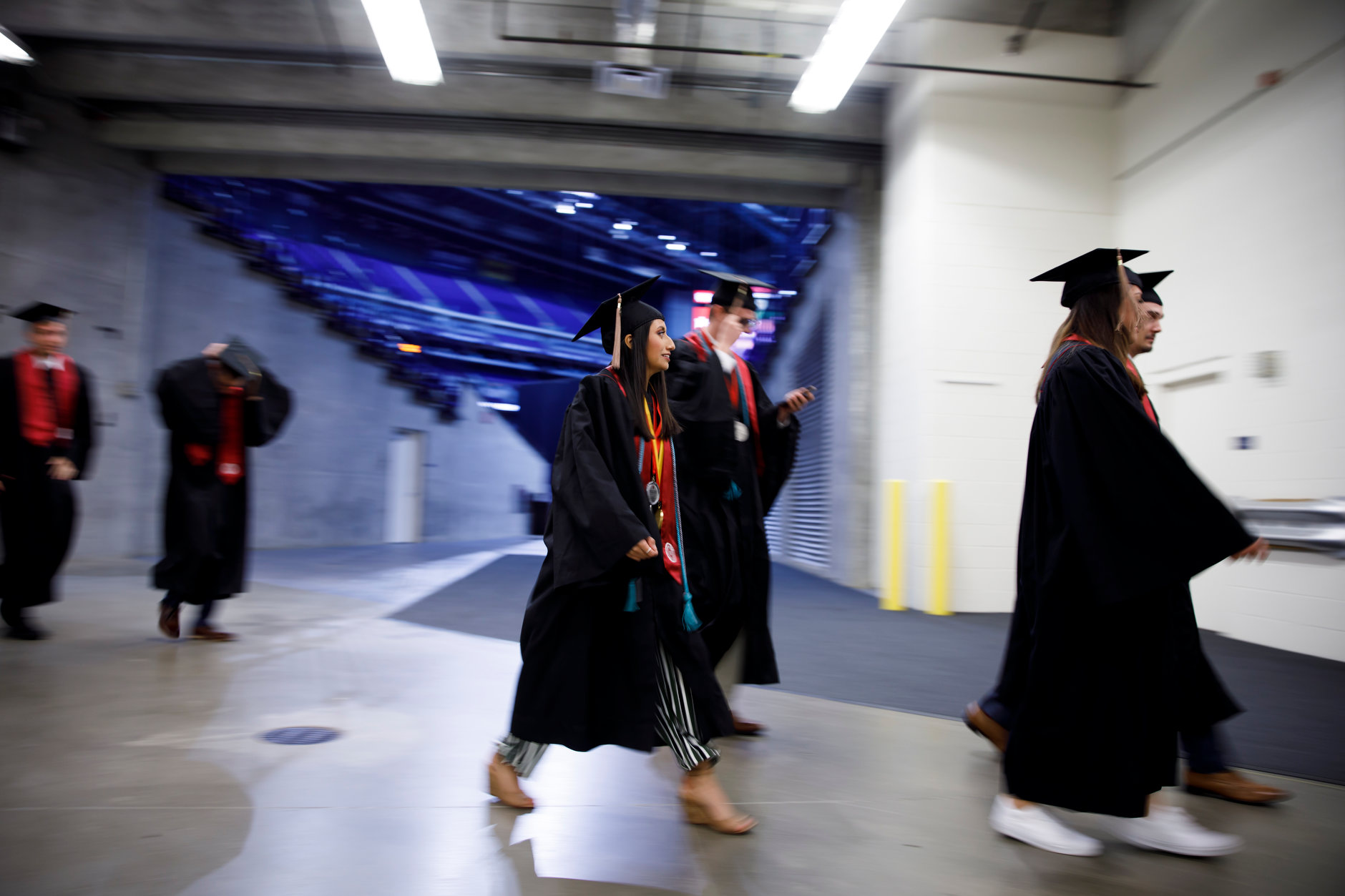 Graduates walk in the processional during the IUPUI Commencement at Lucas Oil Stadium on Saturday, May 11, 2019. (James Brosher/Indiana University)