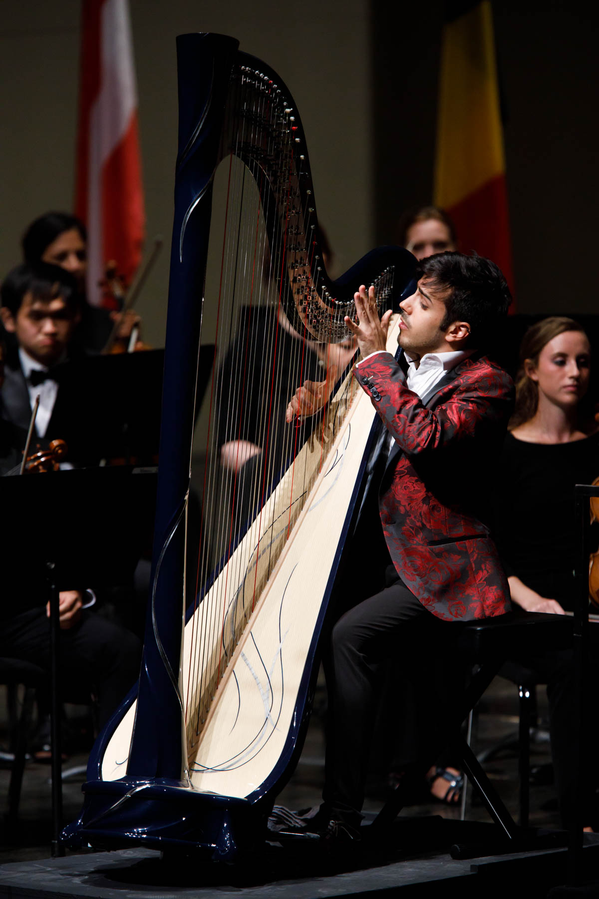 Valerio Lisci of Italy performs with the Indiana University Summer Philharmonic Orchestra during the Stage IV concert at the 11th USA International Harp Competition at Indiana University in Bloomington, Indiana on Saturday, July 13, 2019. (Photo by James Brosher)