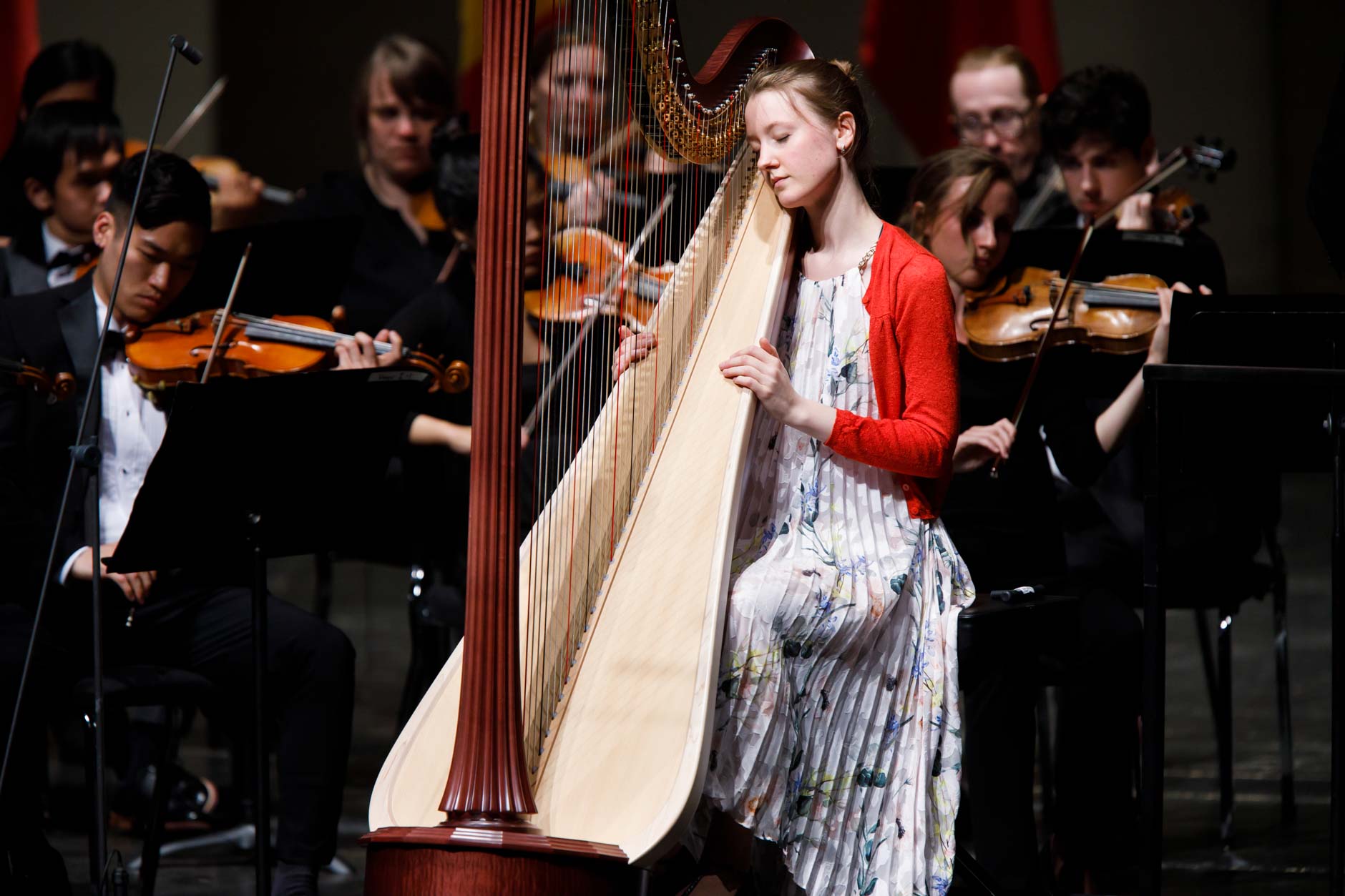 Mathilde Wauters of Belgium performs with the Indiana University Summer Philharmonic Orchestra during the Stage IV concert at the 11th USA International Harp Competition at Indiana University in Bloomington, Indiana on Saturday, July 13, 2019. (Photo by James Brosher)