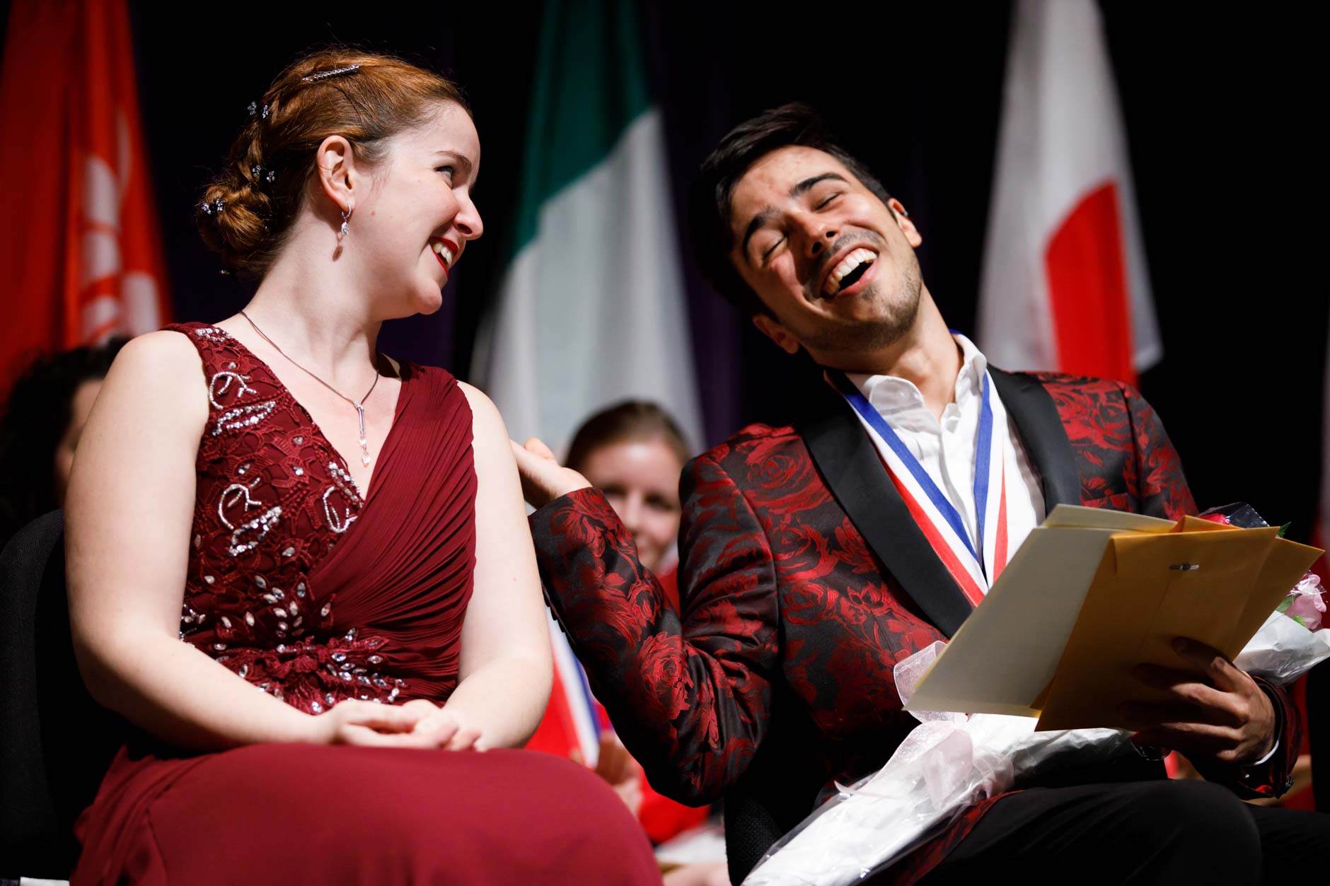 First prize winner Melanie Laurent from France, left, is congratulated by second prize winner Valerio Lisci from Italy during the awards ceremony of the 11th USA International Harp Competition at Indiana University in Bloomington, Indiana on Saturday, July 13, 2019. (Photo by James Brosher)