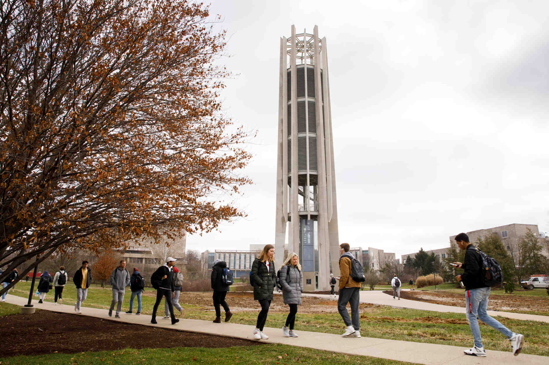 Students walk past the newly-completed Metz Bicentennial Grand Carillon in the Cox Arboretum at Indiana University Bloomington on Monday, Jan. 13, 2020. (James Brosher/Indiana University)