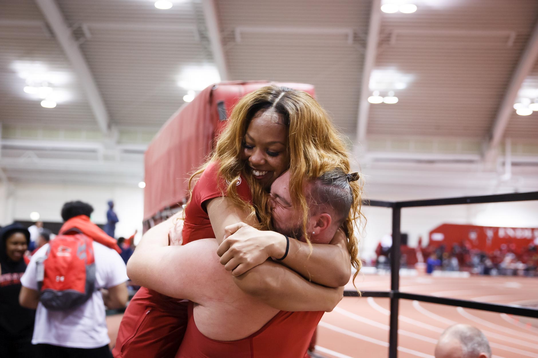 Alabama’s Karmen Williams celebrates with teammate Bobby Colantonio Jr. after Colantonio competed in the weight throw during the Indiana University Relays in Bloomington, Indiana on Friday, Jan. 31, 2020. (Photo by James Brosher)