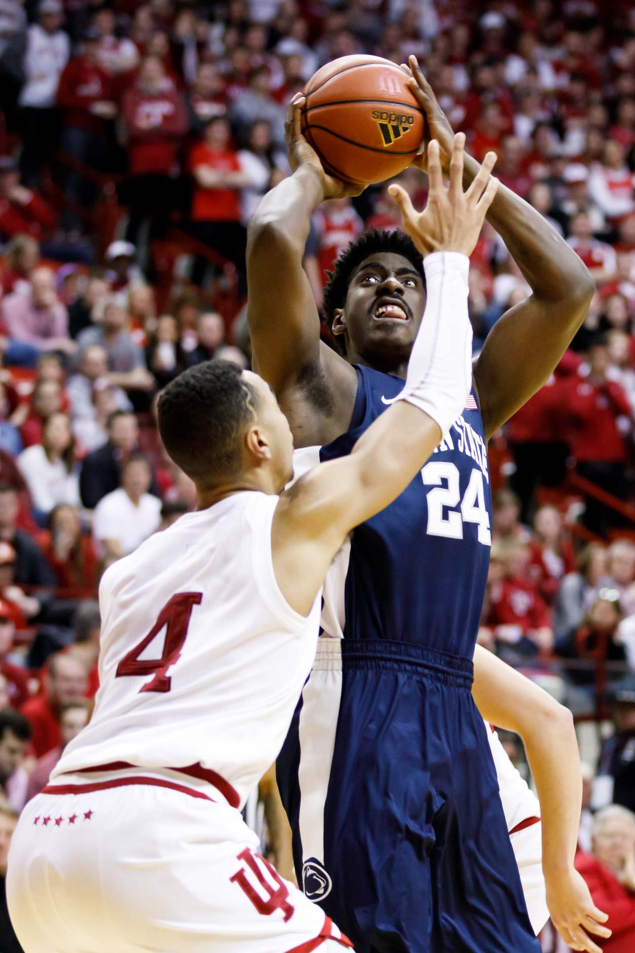 Penn State's Mike Watkins (24) shoots over Indiana's Trayce Jackson-Davis (4) during a NCAA men's basketball game at Simon Skjodt Assembly Hall in Bloomington, Indiana on Sunday, Feb. 23, 2020. (Photo by James Brosher)
