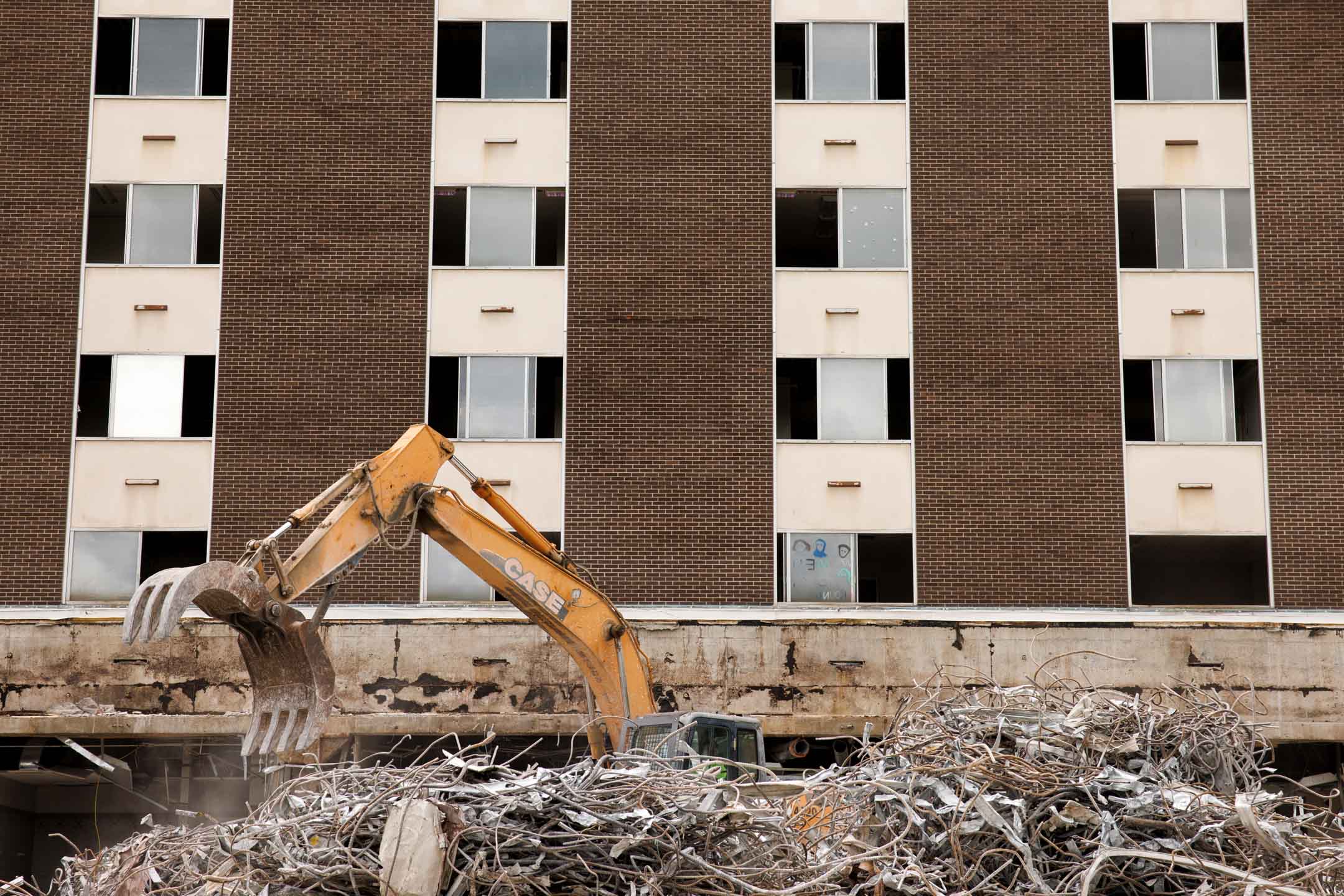 Workers demolish the Poplars Building at IU Bloomington on Tuesday, Aug. 9, 2022. (James Brosher/Indiana University)